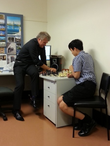 Challenging Philip in chess